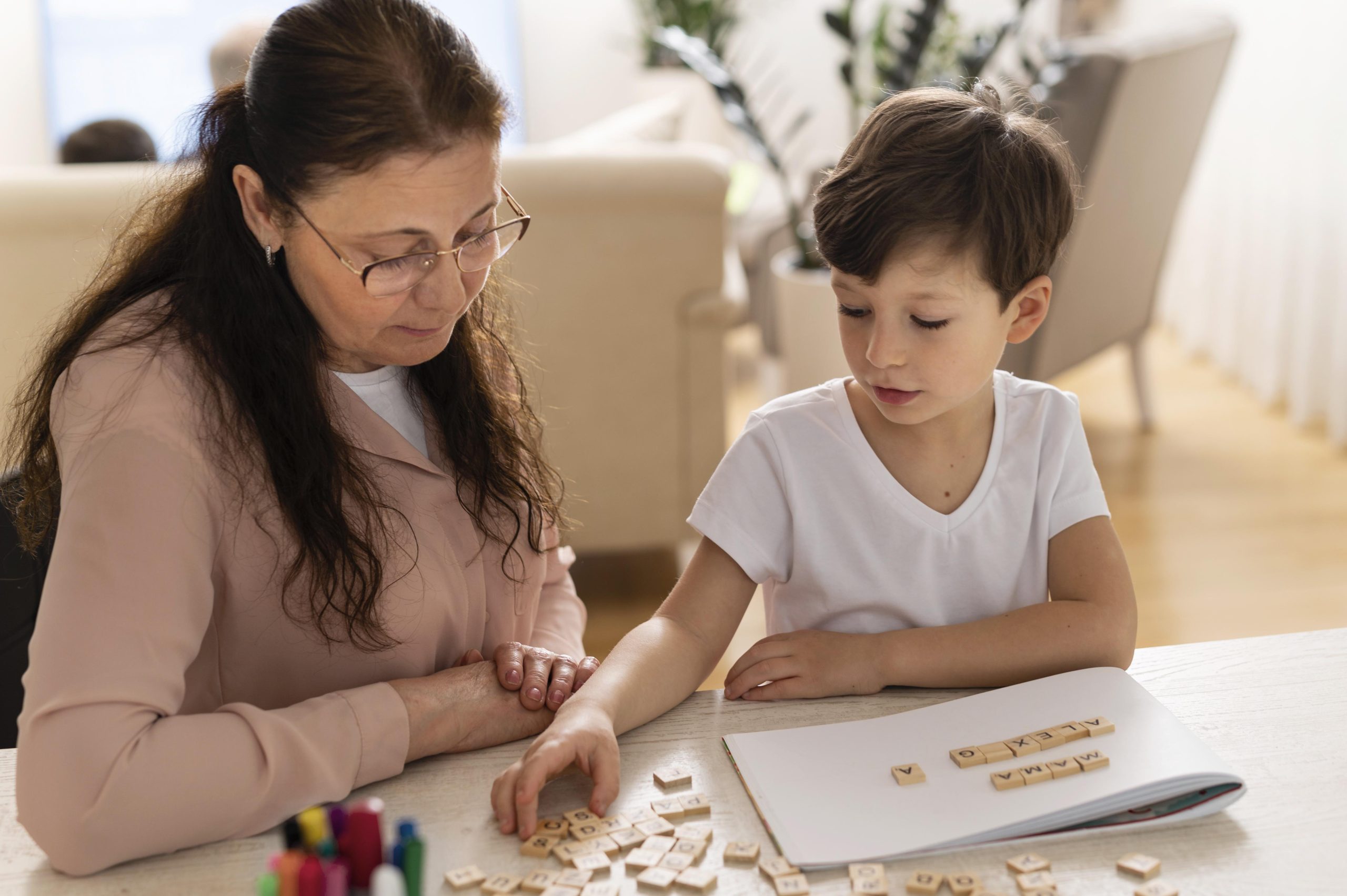 grandchild-doing-homework-with-grandmother